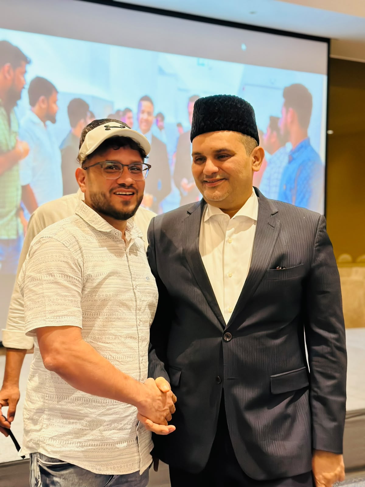 Shameem (@nk.vlog_official) with community leader Sayyid Munavvar Ali Shihab Thangal.
